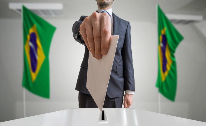 Votação acontece em outubro e eleitor brasileiro precisa justificar ausência ou se inscrever para votar. Foto: Vchalup/Dreamstime